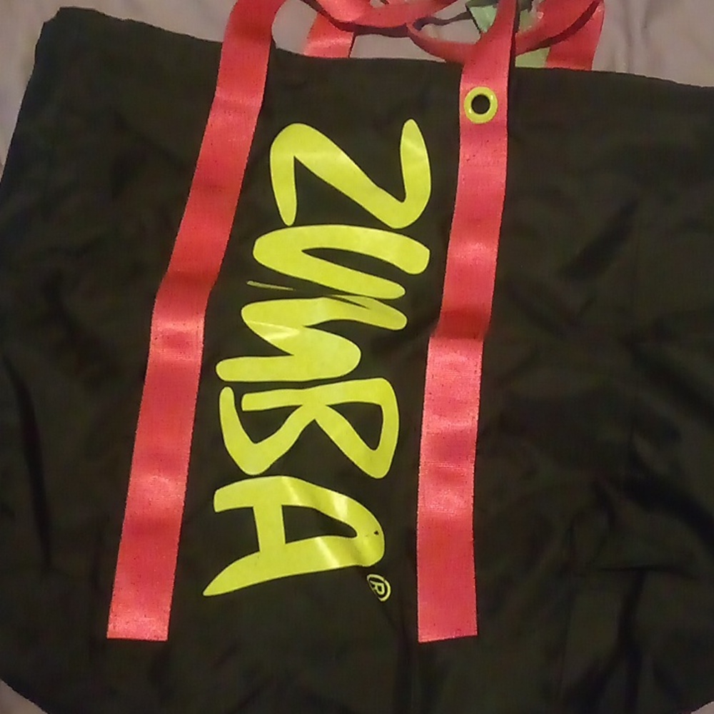 Zumba fitness bag color is black green and pink and it's a medium size bag